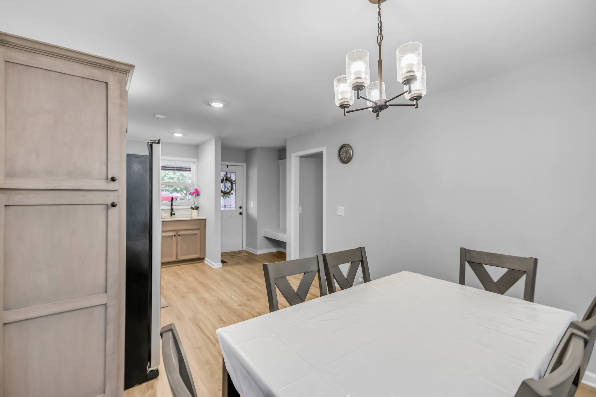105 Jerry Street Portland, TN 37148 - Photo 11 of 40 a kitchen with stainless steel appliances a refrigerator and a chandelier