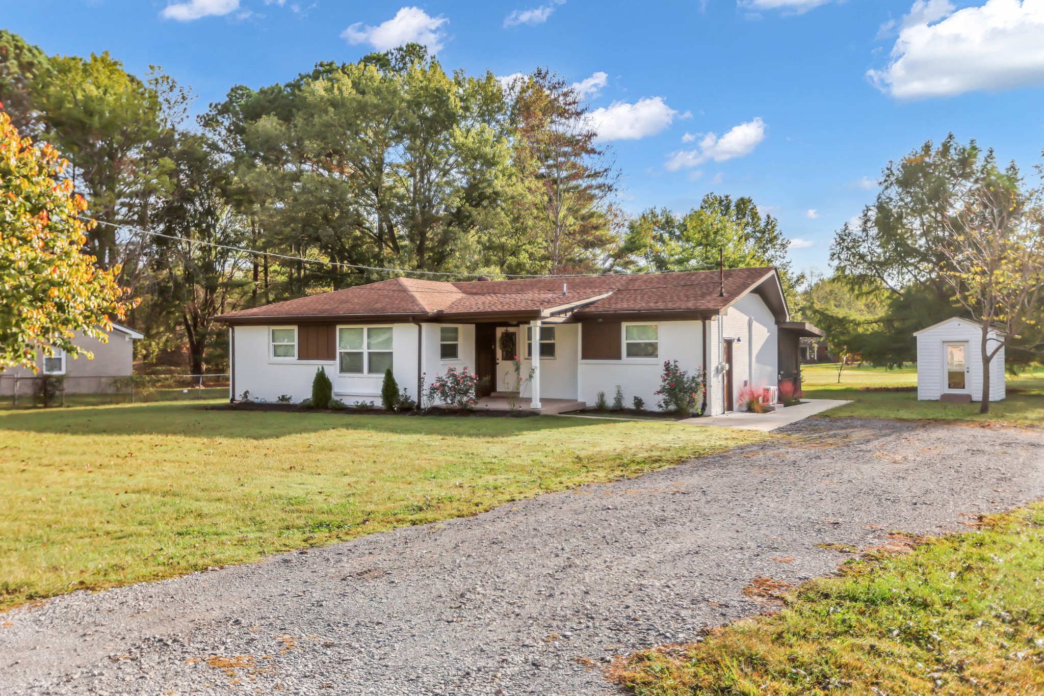 105 Jerry Street Portland, TN 37148 - Photo 2 of 40 a front view of a house with a yard and ocean view