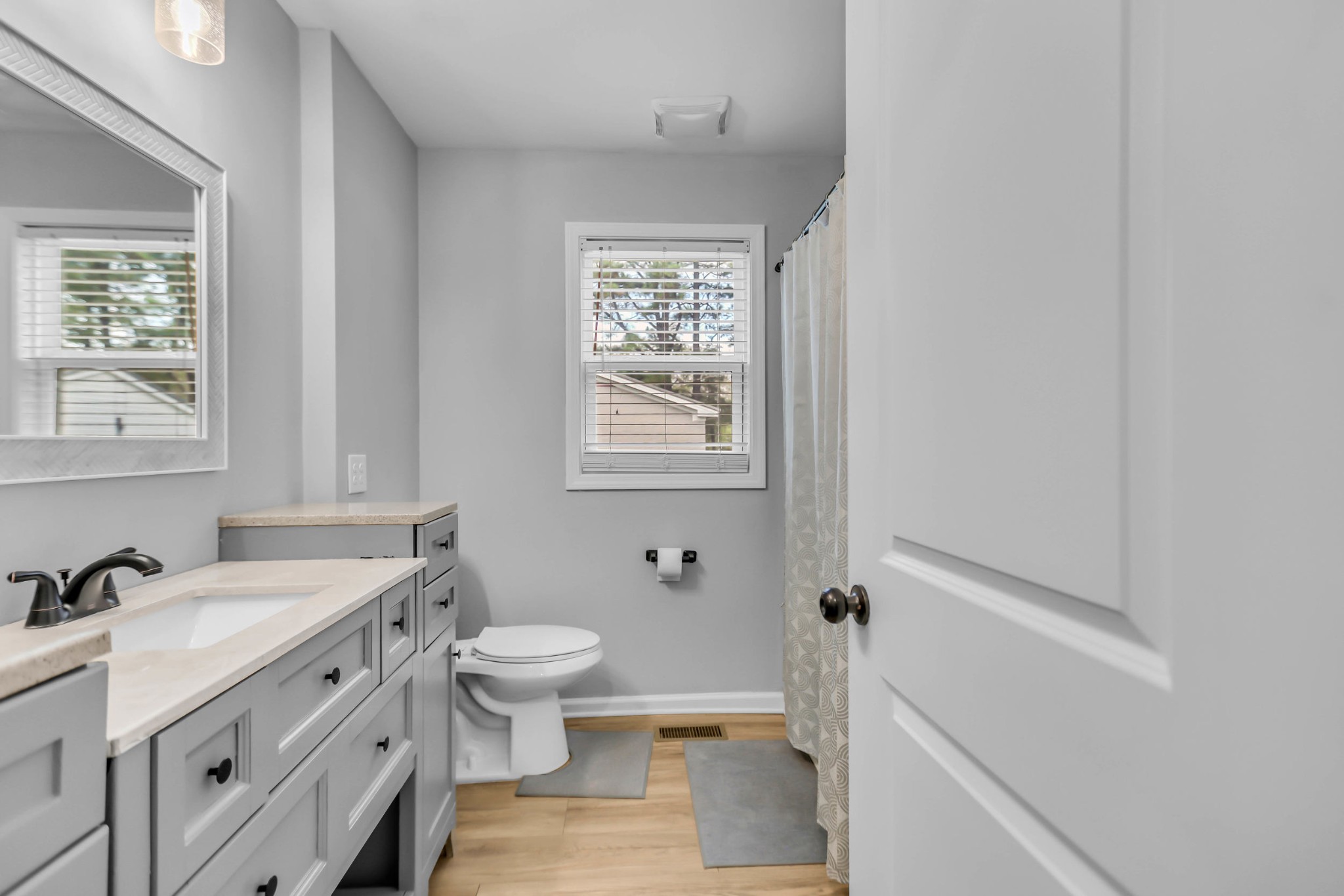 105 Jerry Street Portland, TN 37148 - Photo 21 of 40 a bathroom with a granite countertop sink toilet and shower