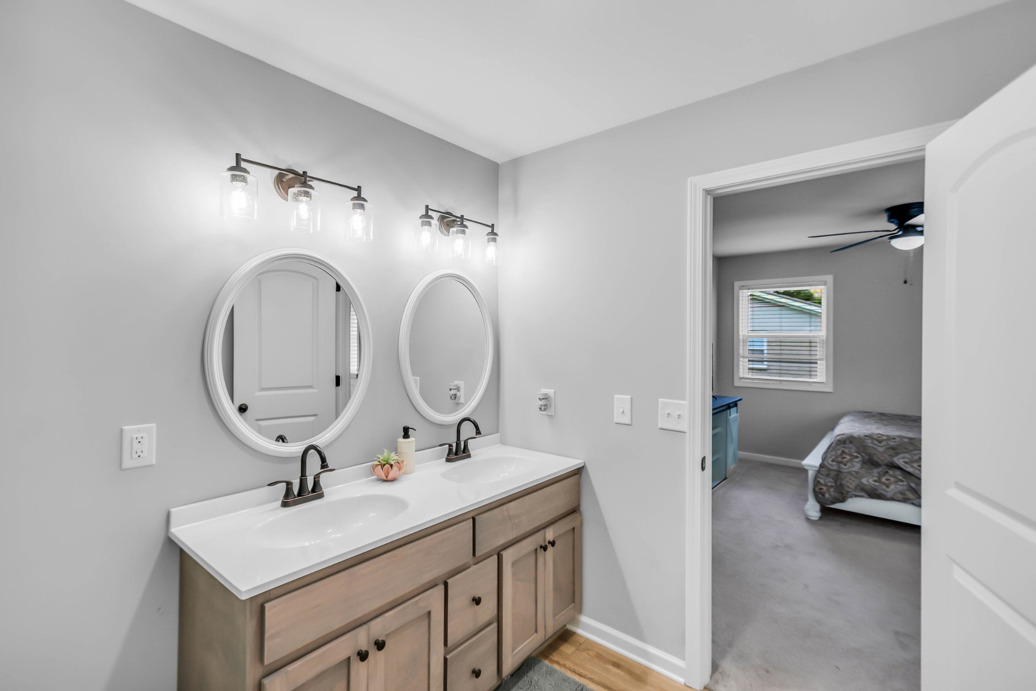 105 Jerry Street Portland, TN 37148 - Photo 24 of 40 a bathroom with a sink and a mirror