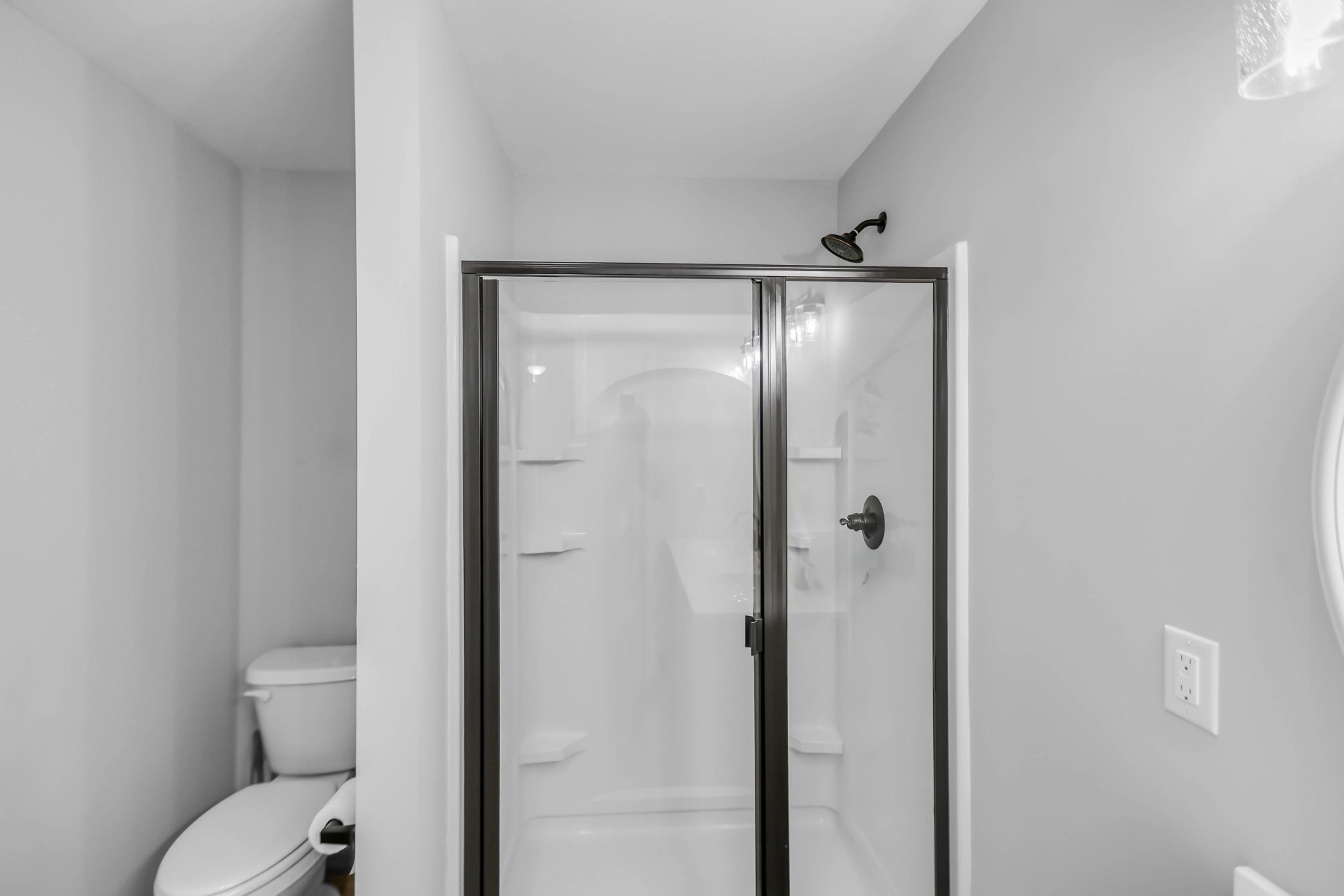 105 Jerry Street Portland, TN 37148 - Photo 25 of 40 a bathroom with a shower and a toilet