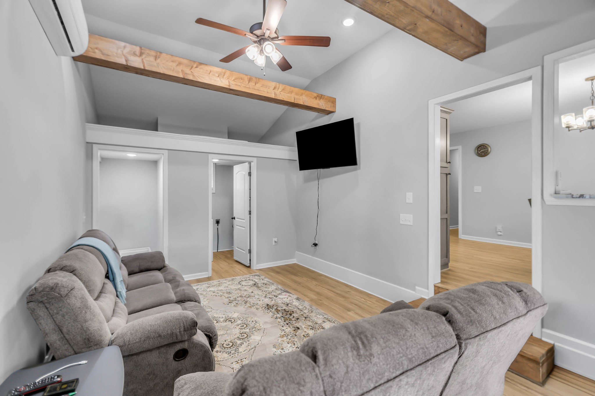105 Jerry Street Portland, TN 37148 - Photo 27 of 40 a living room with furniture and a flat screen tv