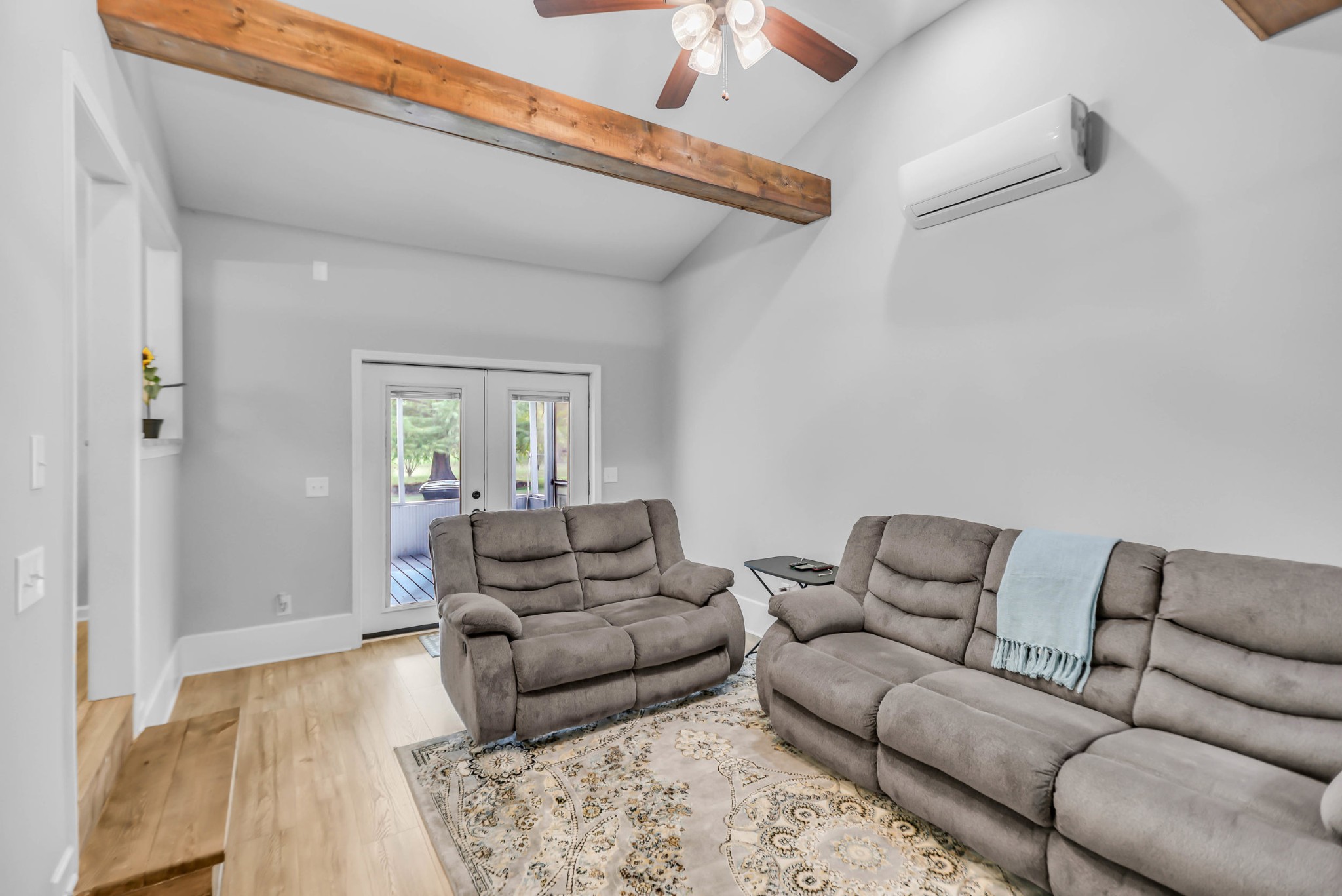 105 Jerry Street Portland, TN 37148 - Photo 28 of 40 a living room with furniture and a wooden floor