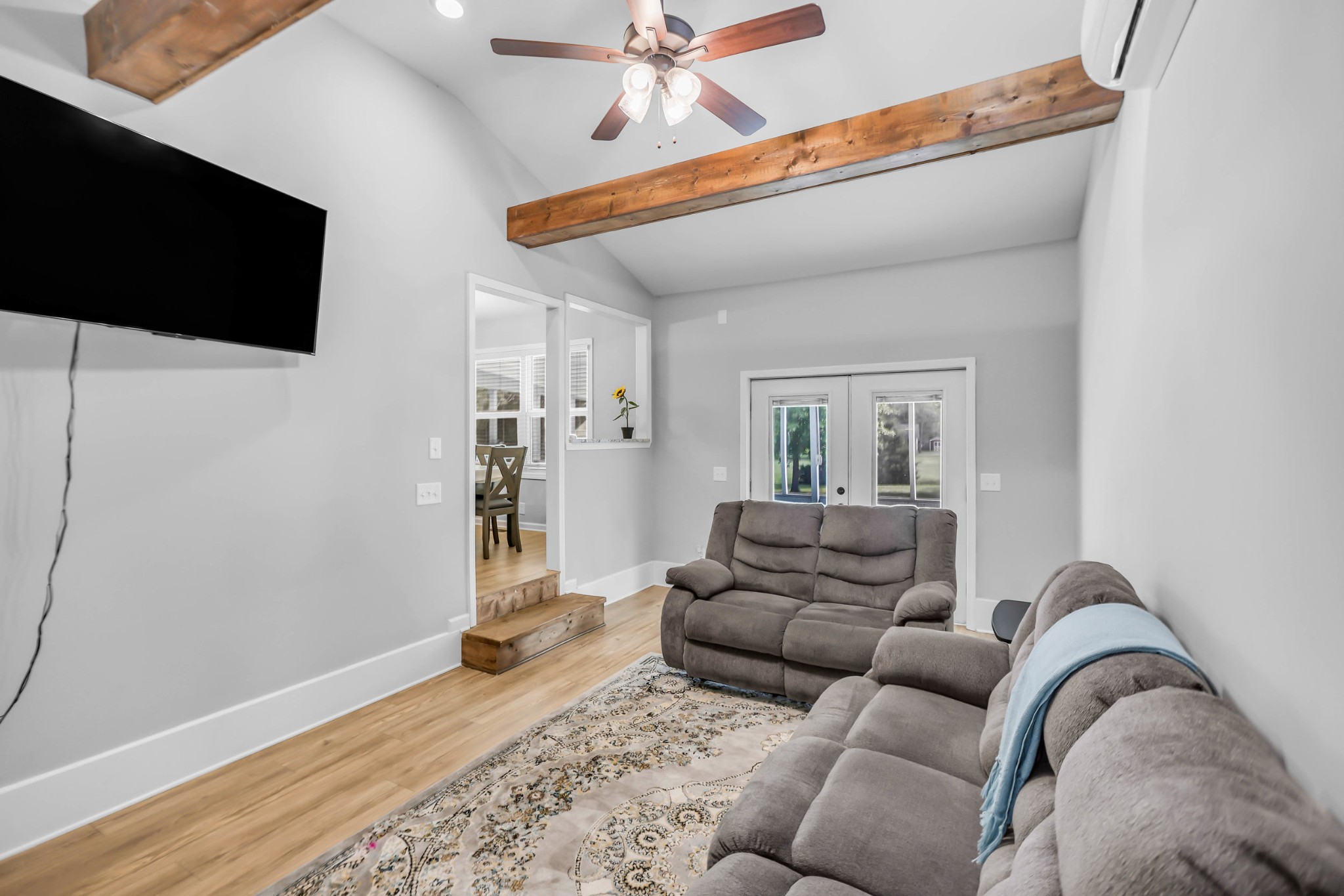 105 Jerry Street Portland, TN 37148 - Photo 29 of 40 a living room with furniture and a flat screen tv