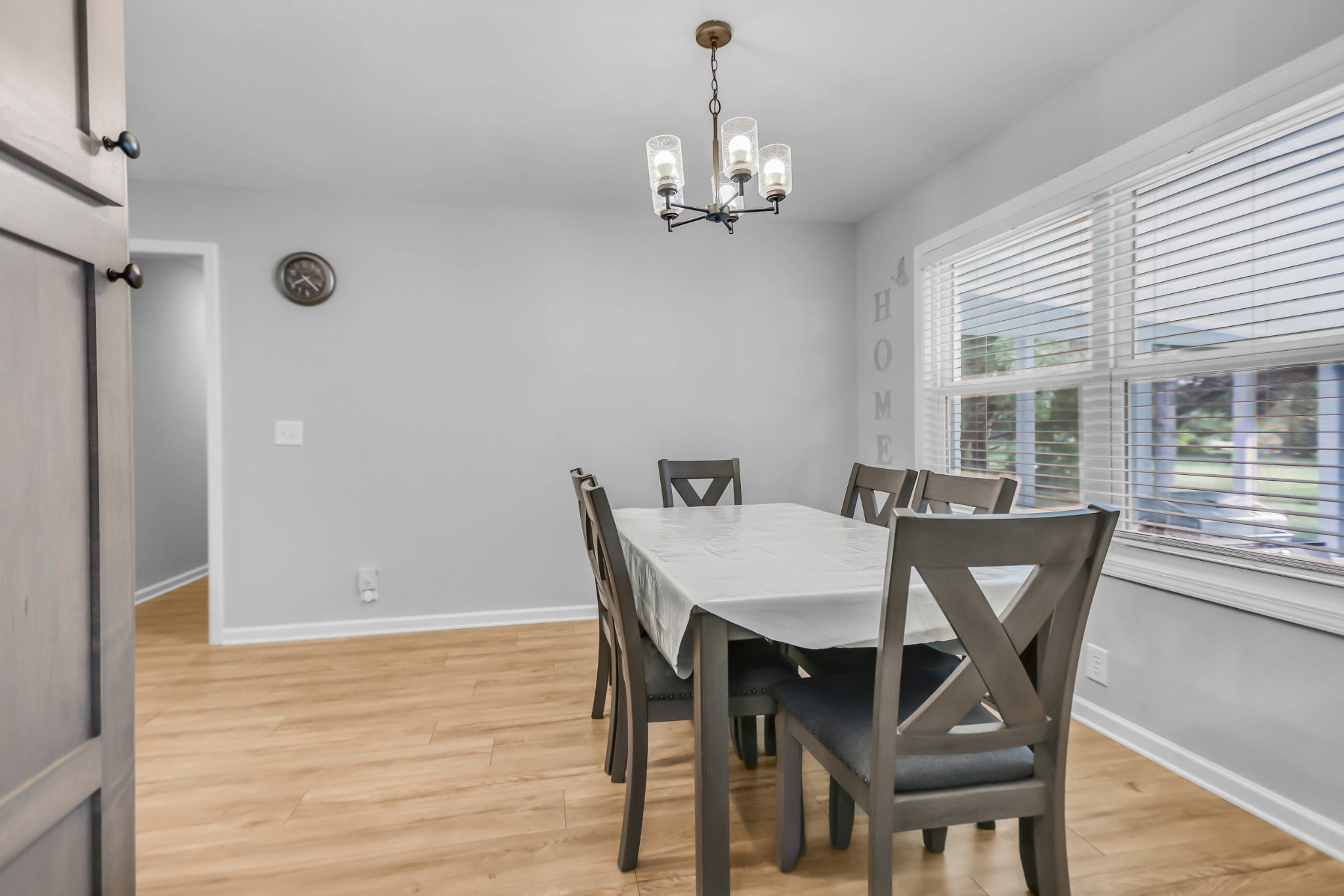 105 Jerry Street Portland, TN 37148 - Photo 32 of 40 a view of a dining room with furniture window and wooden floor