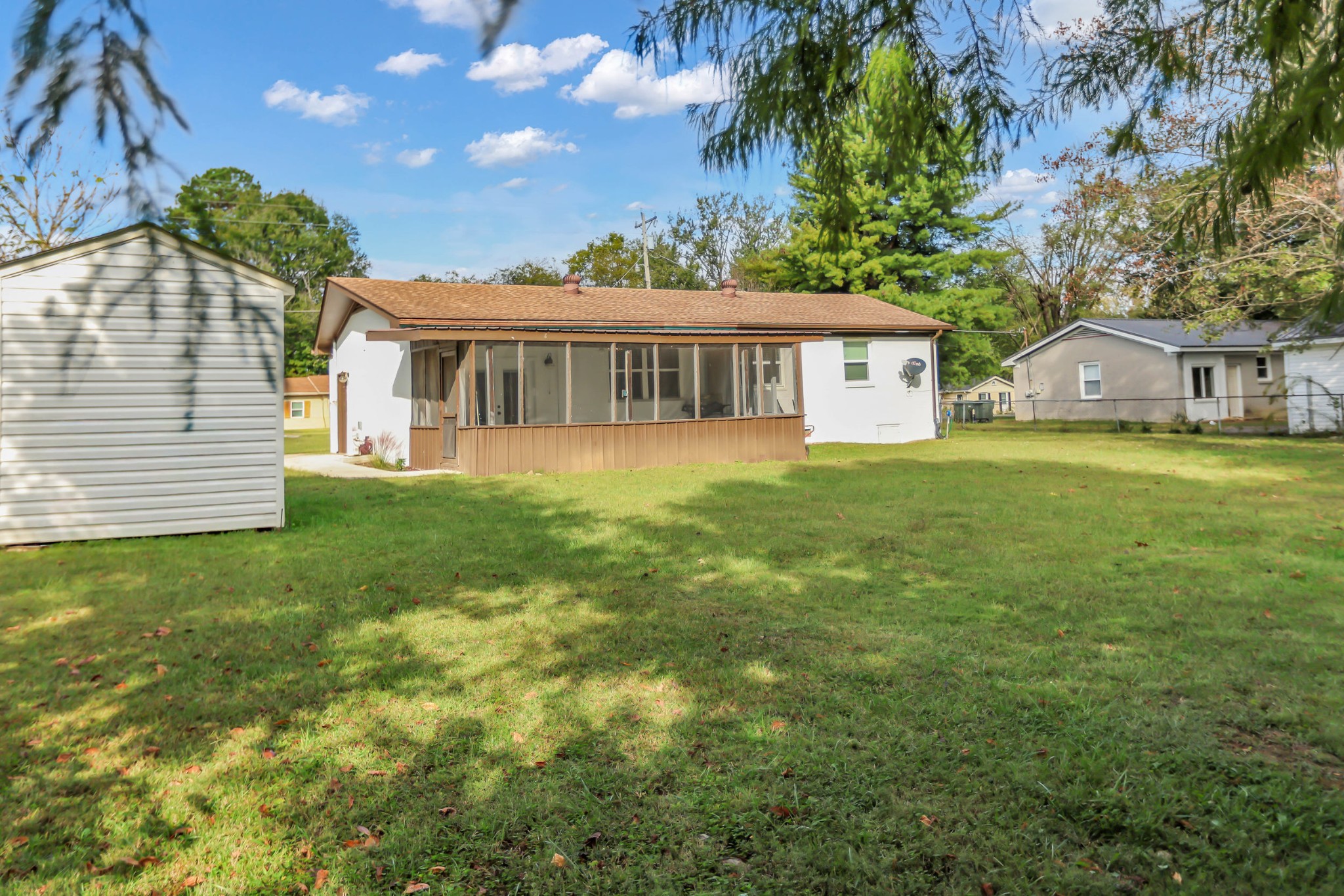105 Jerry Street Portland, TN 37148 - Photo 36 of 40 a front view of a house with a garden