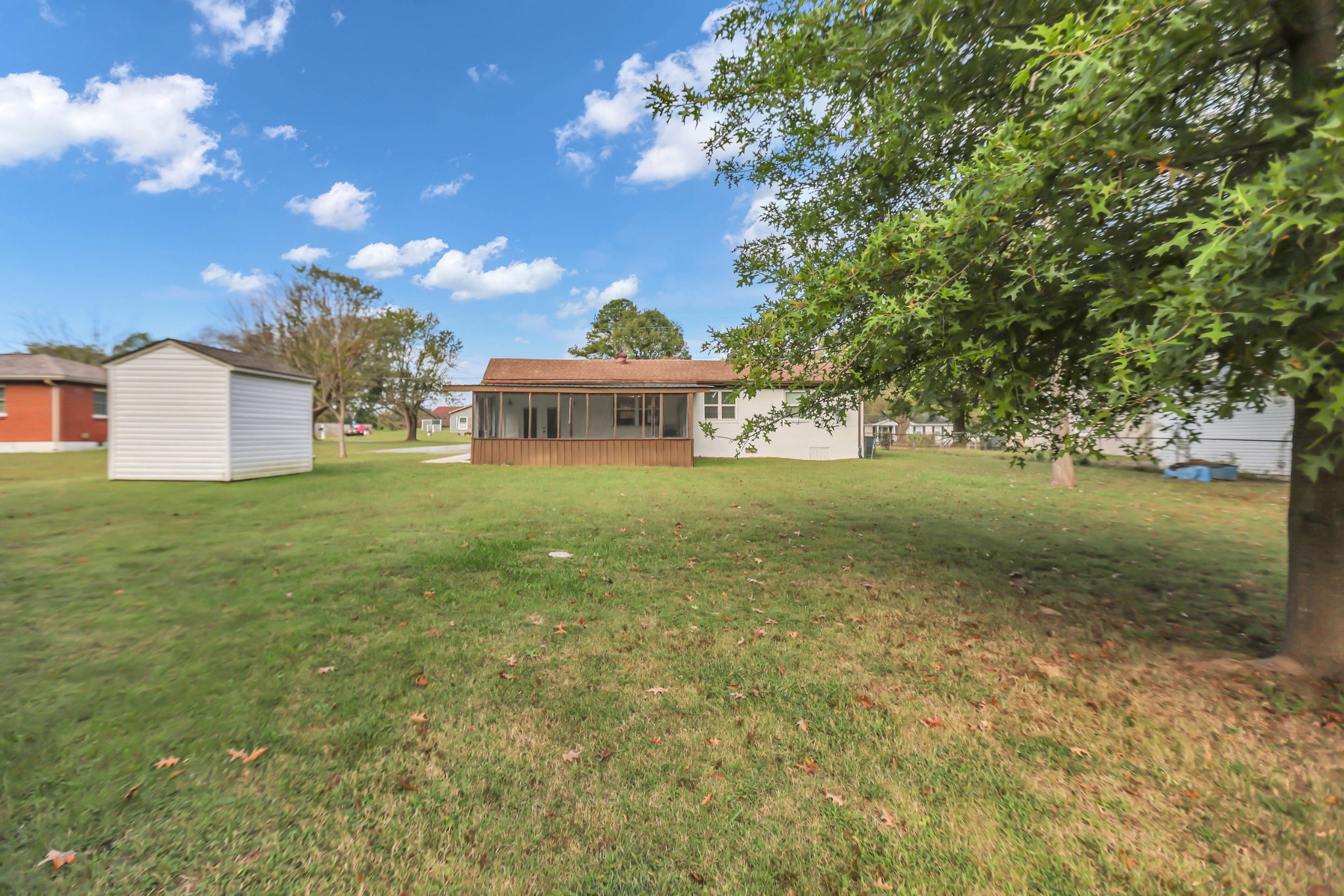 105 Jerry Street Portland, TN 37148 - Photo 37 of 40 a view of a house with a yard