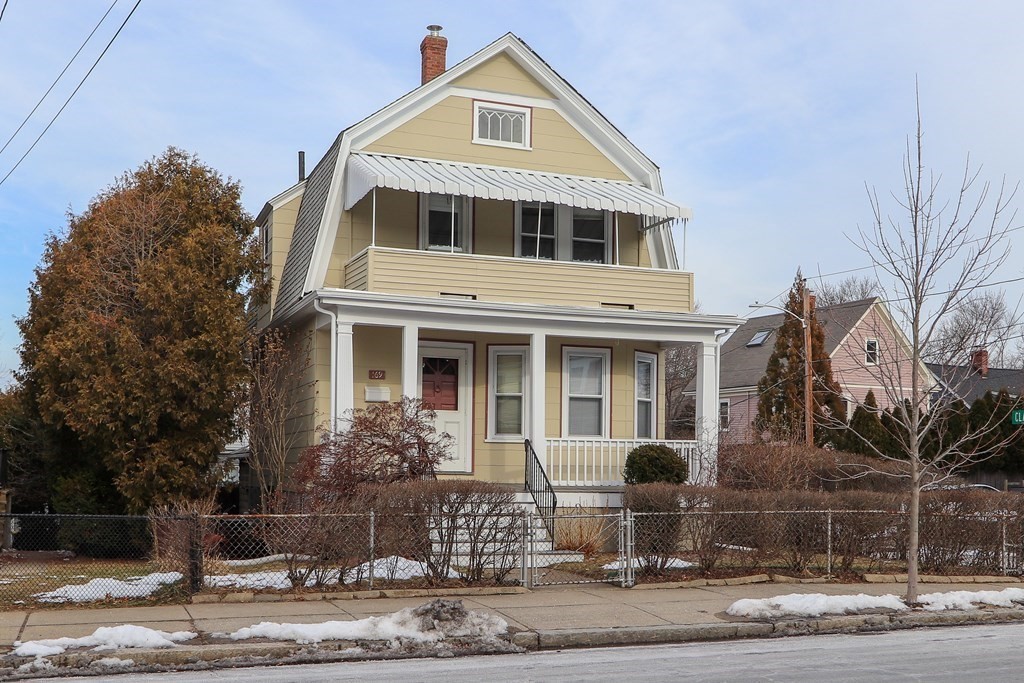 169 George Street Medford, MA 02155 - Photo 17 of 22 a front view of a house with garden