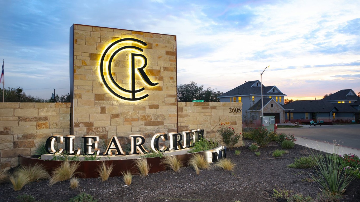 2605 Sam Bass Road, Unit 111 Round Rock, TX 78681 - Photo 3 of 4 a street sign that is on a pole