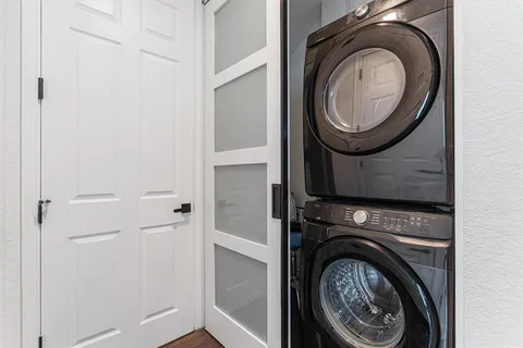 a close view of a washer and dryer in a utility room