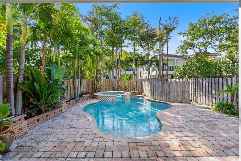 518 Southwest 9th Street, Unit 518 Fort Lauderdale, FL 33315 - Photo 24 of 29 a view of a backyard with swimming pool