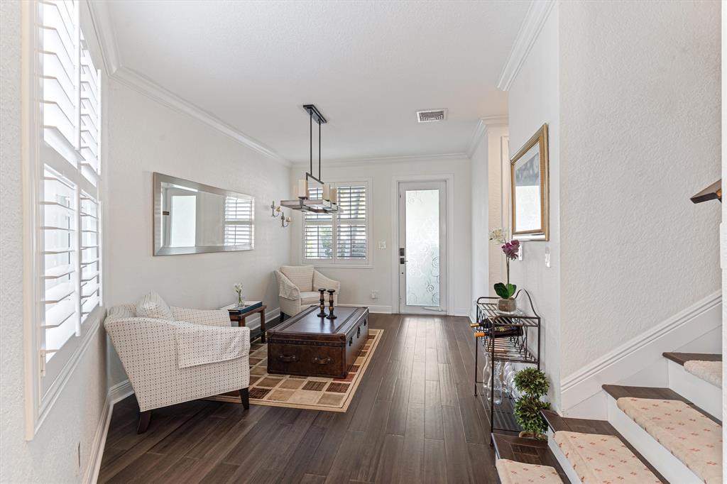 518 Southwest 9th Street, Unit 518 Fort Lauderdale, FL 33315 - Photo 26 of 29 a living room with furniture and wooden floor