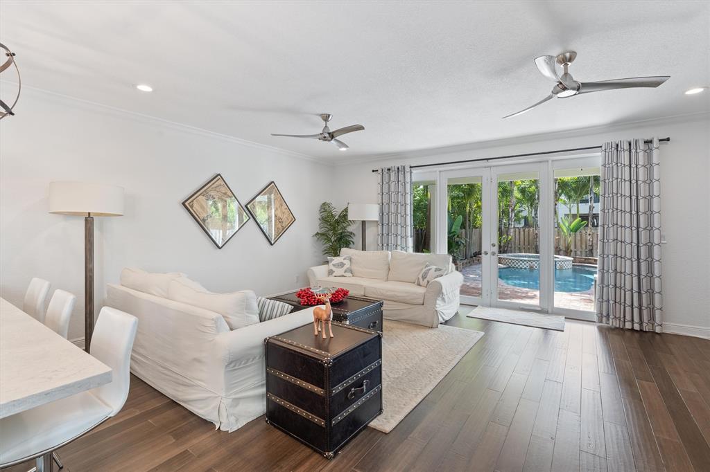 518 Southwest 9th Street, Unit 518 Fort Lauderdale, FL 33315 - Photo 4 of 29 a living room with furniture and a large window