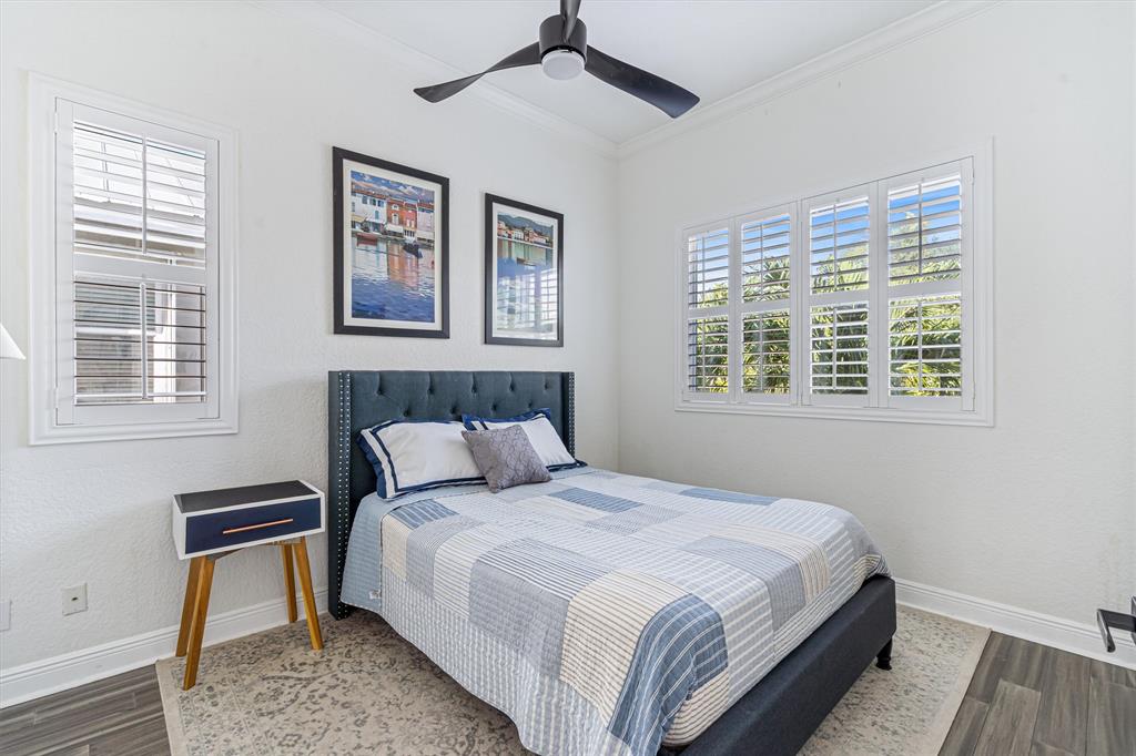 518 Southwest 9th Street, Unit 518 Fort Lauderdale, FL 33315 - Photo 10 of 29 a bedroom with a bed and a window