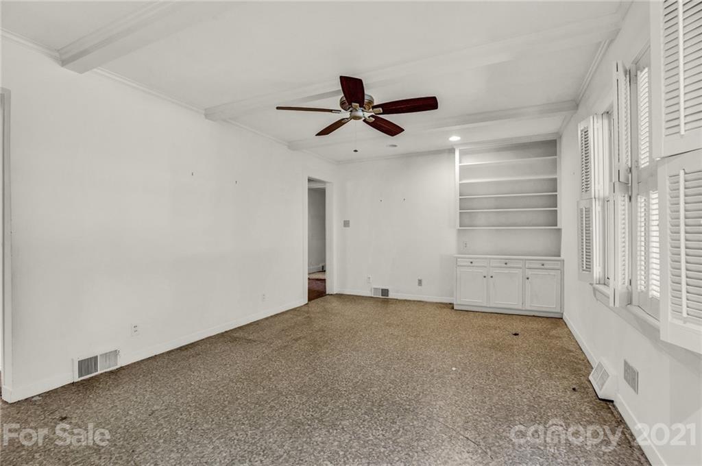 110 West Ridge Road Salisbury, NC 28147 - Photo 29 of 41 an empty room with windows and fan