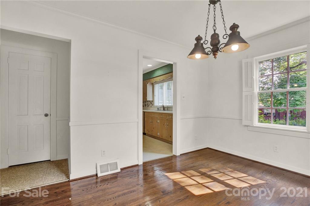 110 West Ridge Road Salisbury, NC 28147 - Photo 31 of 41 a view of an empty room with wooden floor and a window