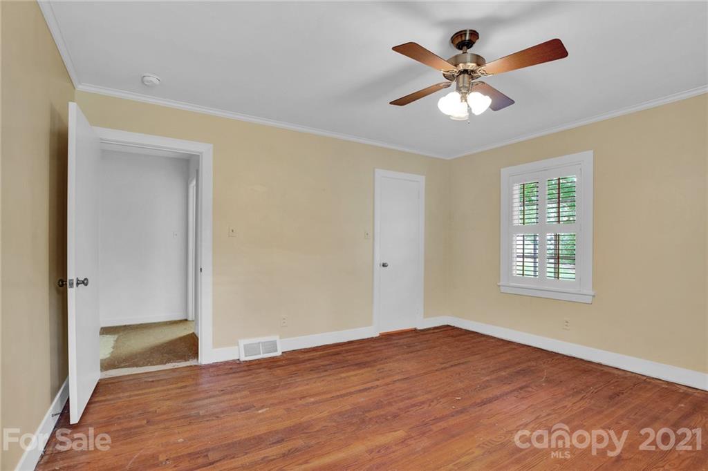 110 West Ridge Road Salisbury, NC 28147 - Photo 37 of 41 a view of a big room with wooden floor and a chandelier fan