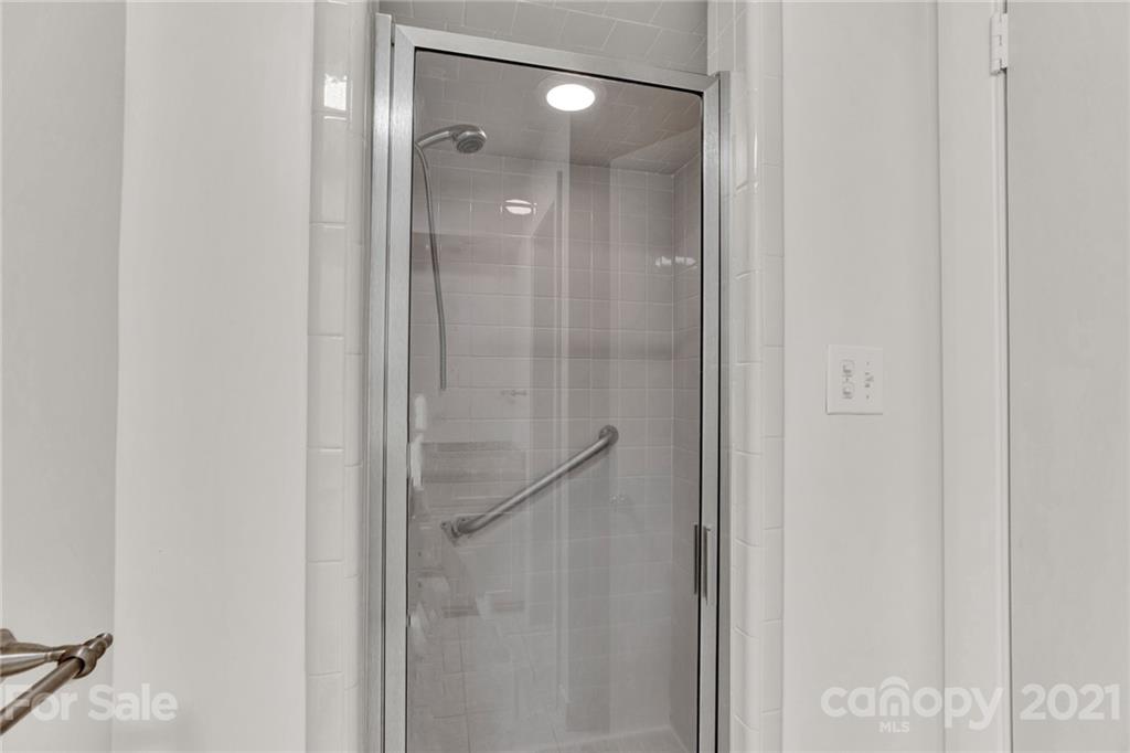110 West Ridge Road Salisbury, NC 28147 - Photo 6 of 41 a bathroom with a glass shower door