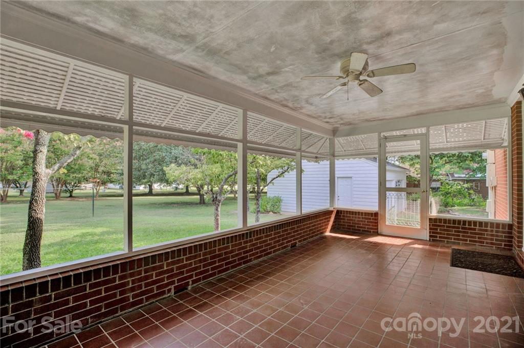 110 West Ridge Road Salisbury, NC 28147 - Photo 7 of 41 a view of a room with wooden floor and outdoor space