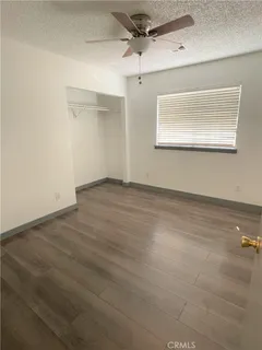 a bathroom with a sink vanity and mirror