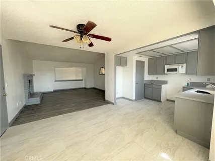a view of a kitchen with a sink and dishwasher kitchen view