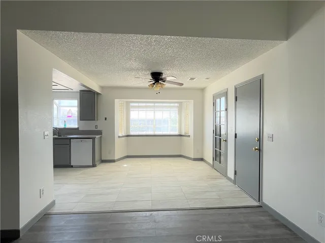 a view of a kitchen with a sink and dishwasher kitchen view