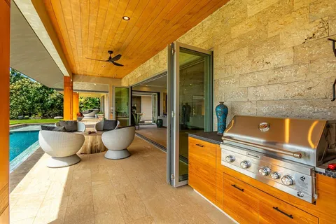 a kitchen with a stove and a microwave