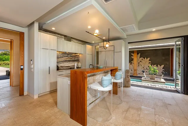 a backyard of a house with seating space