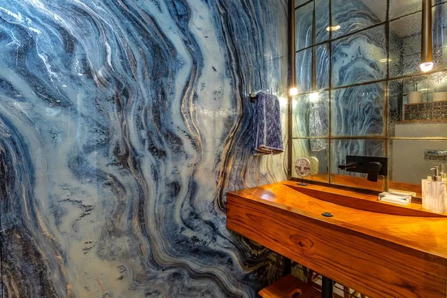 a room with sink and view of living room