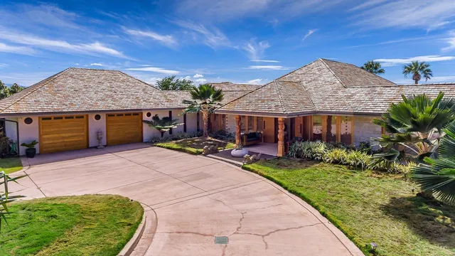 a view of a swimming pool with an outdoor space and seating area