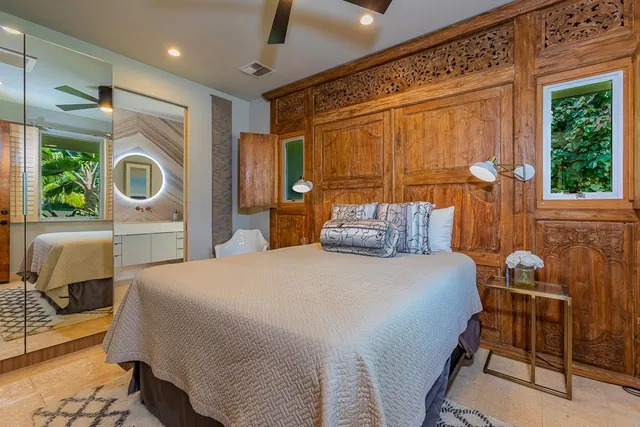 a bed room with a bed and a window