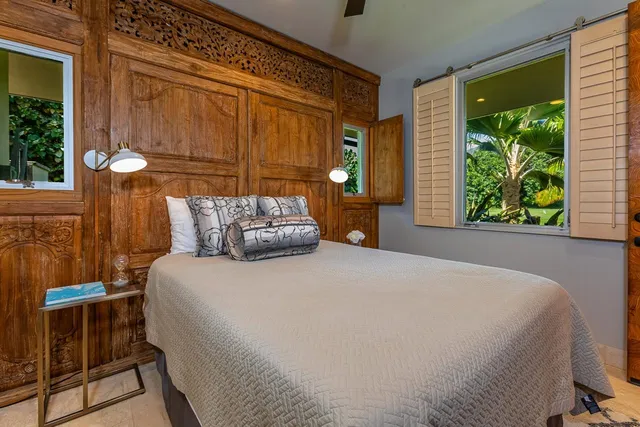 a aerial view of a house with swimming pool garden view and lake view