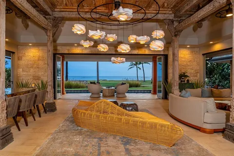 a kitchen with stainless steel appliances granite countertop a sink and a refrigerator