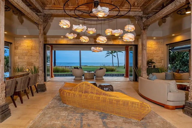 a kitchen with stainless steel appliances granite countertop a sink and a refrigerator