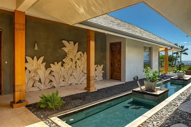 a en suite bathroom with a tub and window
