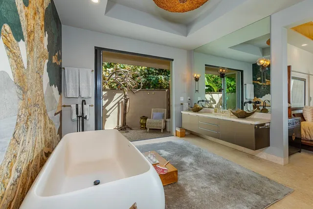 a view of swimming pool with a lounge chair