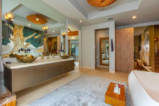 a view of dining room with a table and chairs