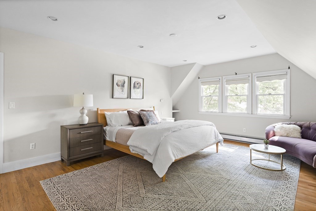 26 Leland Road Brookline, MA 02467 - Photo 11 of 30 a spacious bedroom with a bed and window