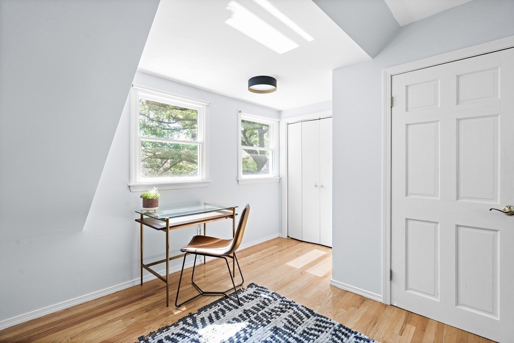 26 Leland Road Brookline, MA 02467 - Photo 15 of 30 a view of a workspace with furniture and a window