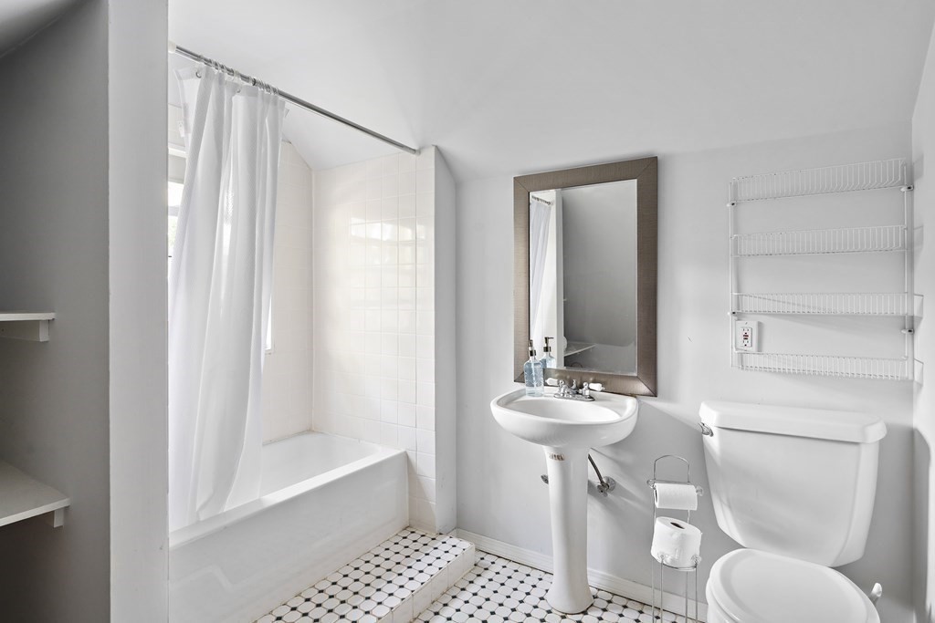 26 Leland Road Brookline, MA 02467 - Photo 17 of 30 a bathroom with a sink toilet and shower