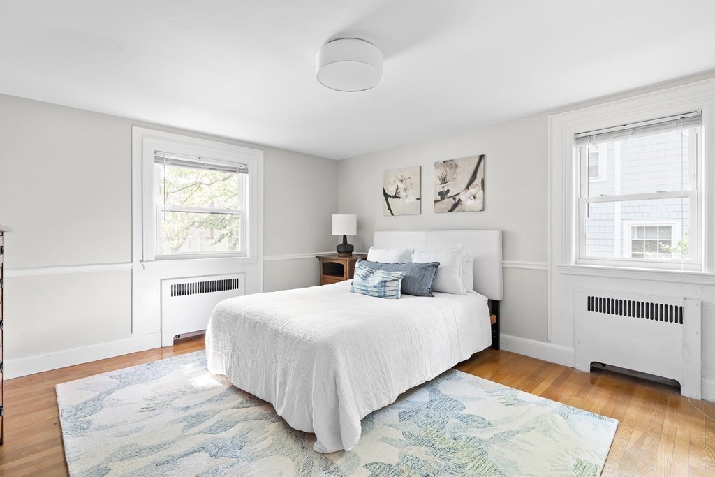 26 Leland Road Brookline, MA 02467 - Photo 19 of 30 a bedroom with a large bed and a window