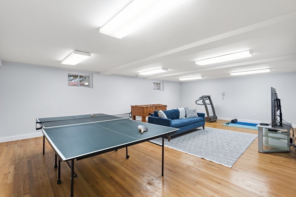 26 Leland Road Brookline, MA 02467 - Photo 22 of 30 a room with furniture and wooden floor