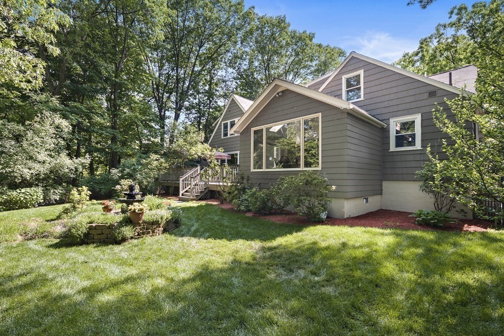 26 Leland Road Brookline, MA 02467 - Photo 23 of 30 a front view of house with yard and green space