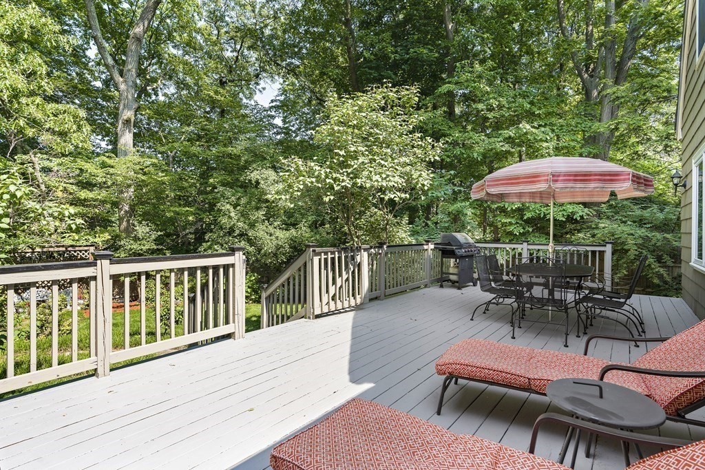 26 Leland Road Brookline, MA 02467 - Photo 27 of 30 a view of balcony with outdoor seating and trees