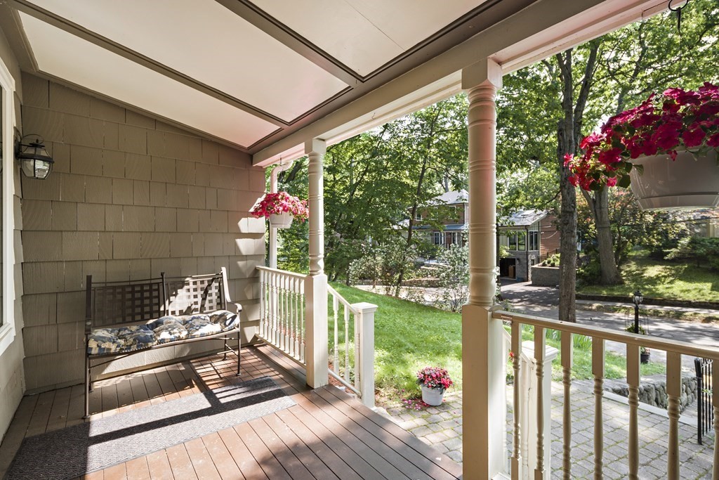 26 Leland Road Brookline, MA 02467 - Photo 3 of 30 a view of a patio with a table and chairs