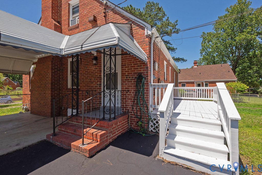 3400 Ryburn Road Richmond, VA 23234 - Photo 34 of 45 Brick exterior featuring a covered carport, covere