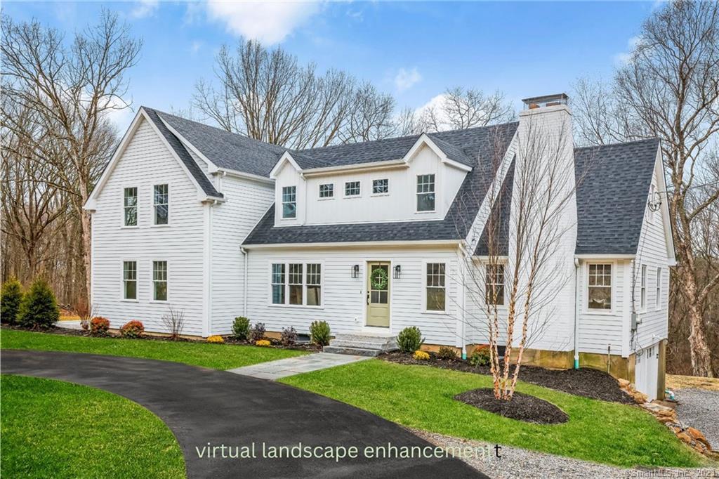 289 Everett Road Easton, CT 06612 - Photo 1 of 1 a front view of a house with a yard