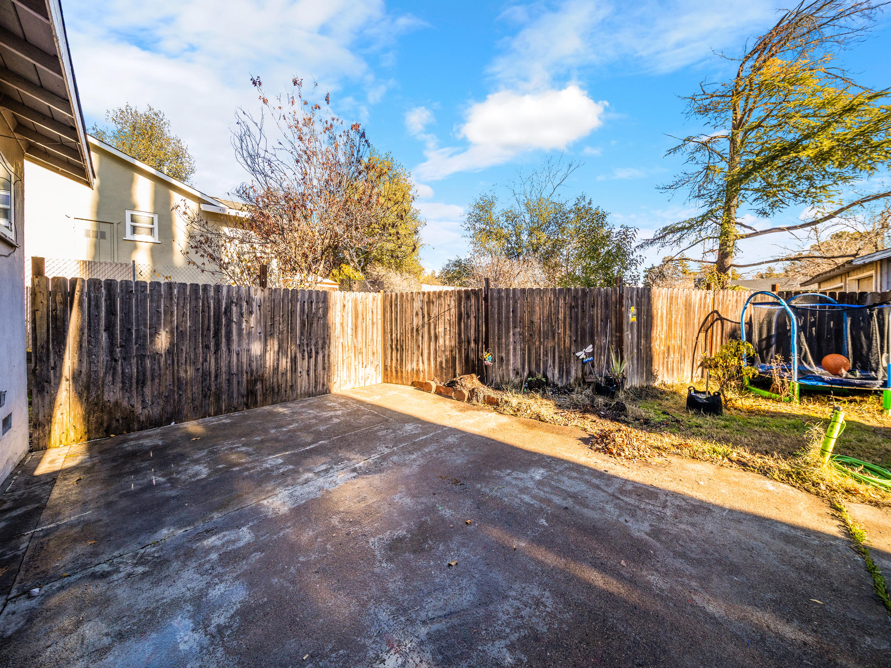 2921 West Way Redding, CA 96002 - Photo 20 of 36 a view of backyard with patio