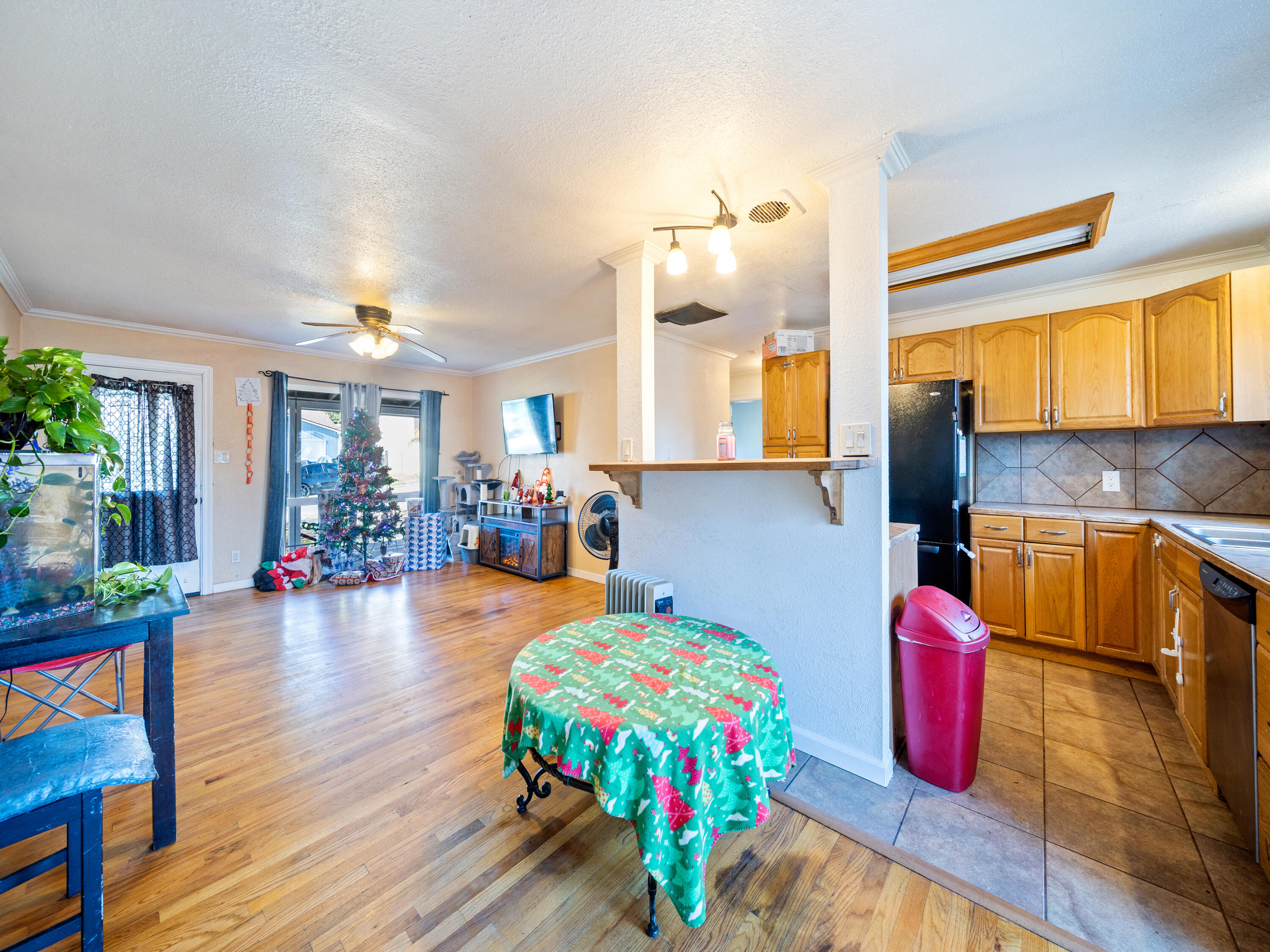 2921 West Way Redding, CA 96002 - Photo 2 of 36 a living room with furniture and wooden floor
