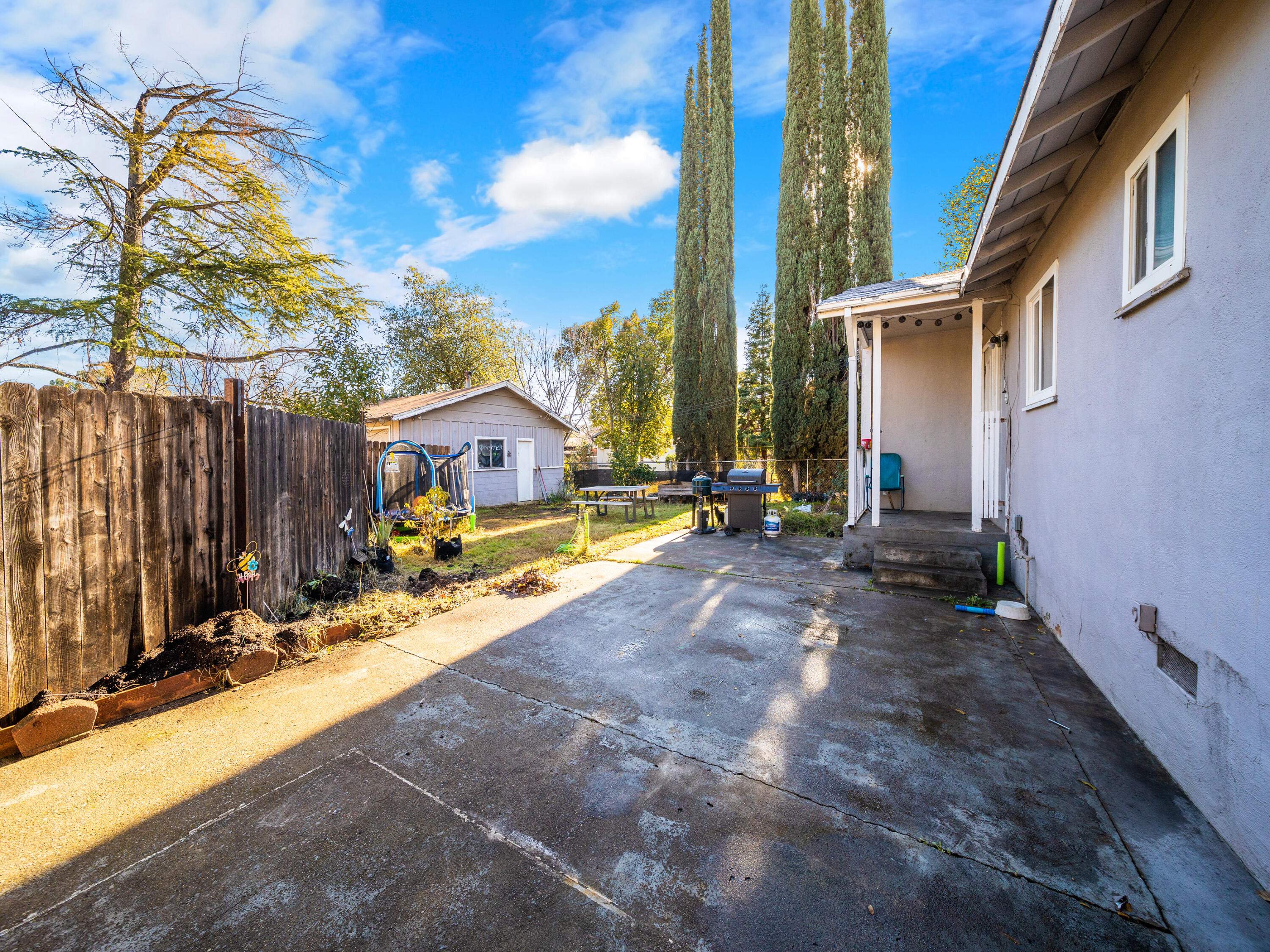 2921 West Way Redding, CA 96002 - Photo 21 of 36 a view of the house with backyard